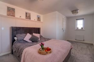 Bedroom One- click for photo gallery